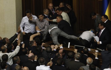 A violent scuffle erupted in Ukraine's parliament over a bill that would allow the use of the Russian language in courts, hospitals and other institutions in the Russian-speaking regions of the country. Photo by Sergei Svetlitsky, copyright © Demotix (24/05/12).