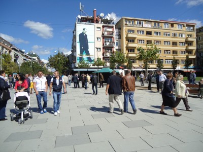 In the center of Prishtina, Rugova is still there, but the colors are washed out. 