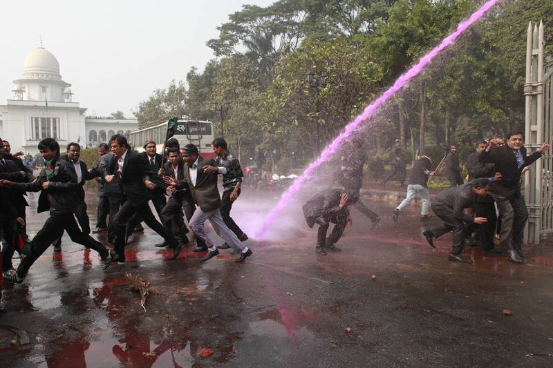 Police fire water cannon, tear shell to stopped a procession by lawyers supporting the opposition BNP and its ally Jamaat-e-Islami near the Supreme Court in Dhaka, Bangladesh. Image by Zakir Hossain Chowdhury. Copyright Demotix (29/12/2013)