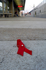 Red Ribbon on Sidewalk