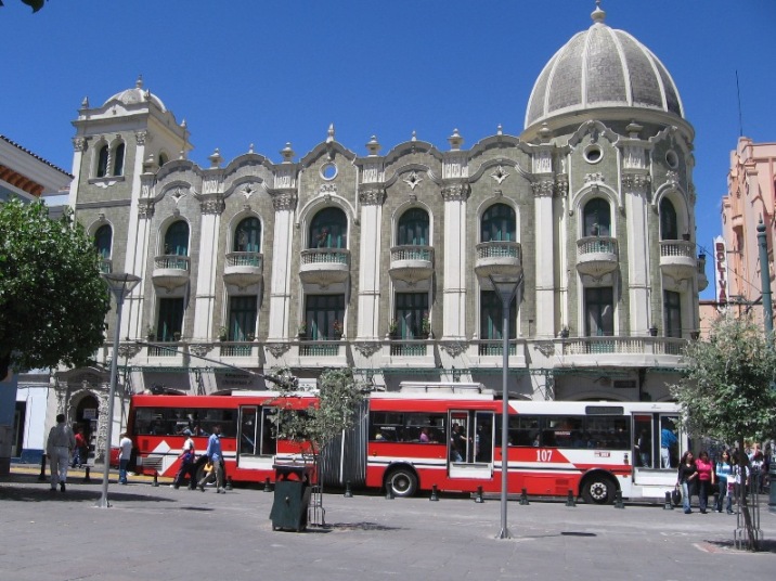 Trolley service through Guayaquil St in Quito, nearby the Plaza Grande.  Photo credit to Wikimedia Commons