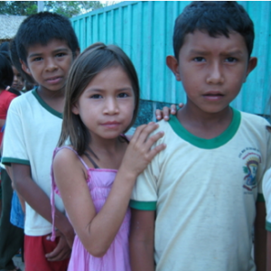 Kids lining up to receive health care along the border of the Amazon river in Brazil