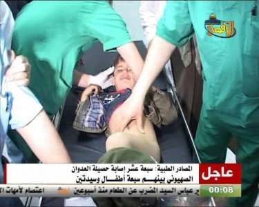 At Al Shifa hospital, one of the children injured by the shell that targeted Al Hilo house as the family was playing soccer. Screenshot of Al Aqsa TV report taken by Muhammad Qudaih in Gaza.