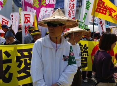 Partecipante alla manifestazione contro il nucleare, Taipei, Taiwan, 20 marzo 2011. Immagine di KarlMarx ripresa da Flickr (CC BY-NC-ND 2.0).