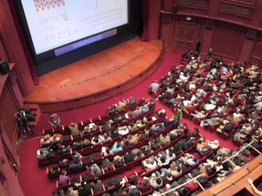 Audience at Thessaloniki Documentary Festival. Screenshot from YouTube video by tbihlaz.
