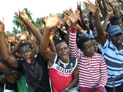 Supporters of Charles Blé Goudé, leader of the Student Federation of Cote d’Ivoire who has called young Ivorians to arms at a rally in Abidjan. Image by Stefan Meissel, copyright Demotix (21/12/10). 