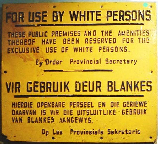 A sign from the Apartheid era in South Africa. Photo from Wikimedia Commons released by user El_C