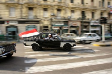 Egypt: Taxi Driver Celebrating with Egyptian Flag