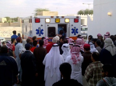 Ambulance brings the body for burial