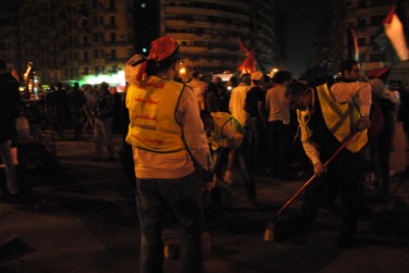 Tahrir at night. Youth cleaning the square after a long day - Twitpic photo by Lilian Wagdy