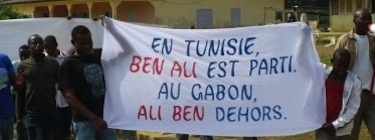 Meyo-Kye, North Gabon, 2 February, 2011. Banner reads: "In Tunisia, Ben Ali left. In Gabon, Ali Ben out." Image provided via Julie Owono
