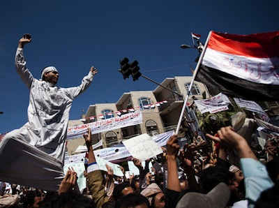 Protester takes part in the funeral of Abdullah Hamid al-Jaify, an anti-government activist killed in clashes with the police, in March 2011 in Sana'a, Yemen. Image by Giulio Petrocco, copyright Demotix (11/03/11).