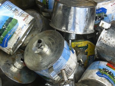Paraffin lamps on sale at Chinseu market, Malawi, for 30 kwacha apiece. Paraffin is hard to come by, so some people have been using diesel fuel, which has the unfortunate effect of creating smog clouds in one's home. Image by Flickr user john.duffell (CC BY-NC-SA 2.0).