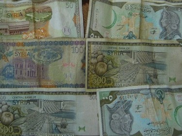 Syrian pounds. Image by Flickr user shellfish (CC BY-NC-ND 2.0).