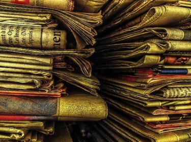 Old newspapers. Image by Flickr user ShironekoEuro (CC BY 2.0).