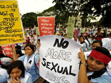 Students hold placards denouncing sexual abuse at their school, VNC, Bangladesh. Image by safin ahmed, copyright Demotix (12/07/2011).