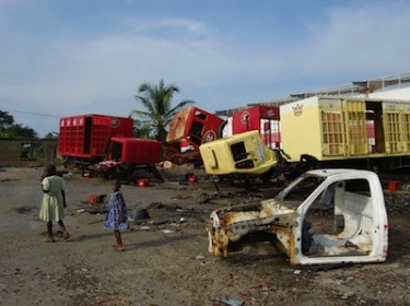 In February 2008, anti-government riots spead through Cameroon. These buildings and vehicles in Kumba were targeted for being government related or owned. Image by Caroline Thomas, copyright Demotix (04/03/2008).