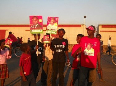 Supporters of Zambian presidential candidate Hakainde Hichilema display his campaign posters. Image by Owen Miyanza, copyright Demotix (02/09/2011).