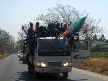 Supporters in a truck celebrate the victory of opposition leader Michael Sata as he was sworn in as the fifth Zambian president. Image by Owen Miyanza, copyright Demotix (23/12/2011).