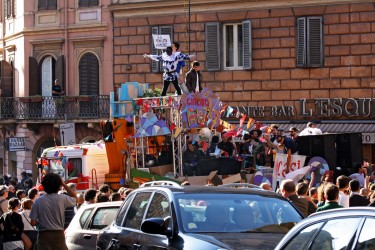Artists from the occupied Cinema Palazzo parade at Saturday's march in Rome, before it turned violent.