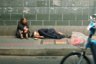 Poverty in Guangzhou, China. Image by Flickr user tarotastic (CC BY 2.0).