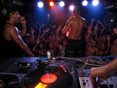Los Aldeanos, a Cuban rap group, perform in  Seville. Photo by Orianomada, CC:BY-NC-SA
