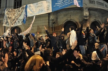 Protesters gather in Bucharest to protest austerity measures. Photo by GEORGECALIN, copyright © Demotix (19/01/12).