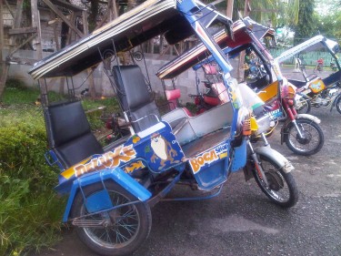 Trike die speciaal is aangepast aan de heuvelachtige straten van Pagadian, Filipijnen. Foto van de auteur.