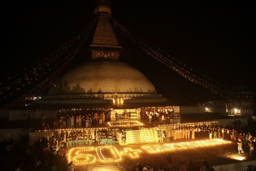 People participate in a programme on 60+Earth Hour in Kathmandu, Nepal. Image by Sunil Sharma. Demotix (26/3/2011))