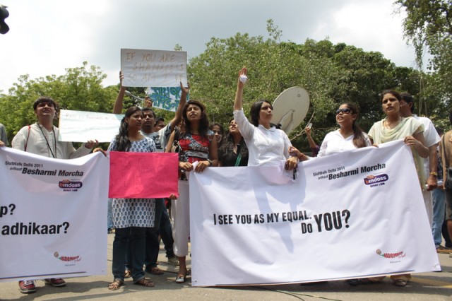 Participants at the Delhi Slutwalk shout slogans and hold banners. Image by Rahul Kumar. Copyright Demotix (31/7/2011).
