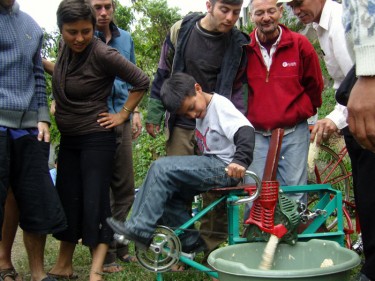 Demonstrating the Maize Mill in Atitlan by Maya Pedal