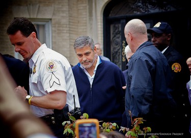 George Clooney handcuffed at rally for peace in Sudan.  