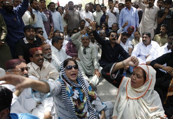 Supporters of ruling Pakistan People Party shout in the protest. Image by Rajput Yasir. Copyright Demotix.