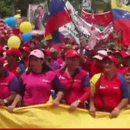 Screenshot of the Real News Video of people marching in Venezuela