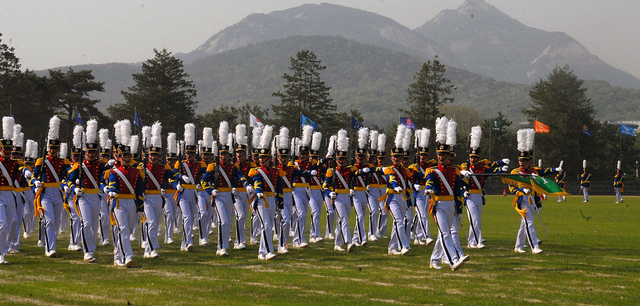 Image of parade of the Korea Military Academy pupils in South Korea, by Flickr User Morning Calm News (CC BY-NC-ND 2.0).