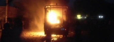 Burning Sudanese police car, shared by @his_moezness