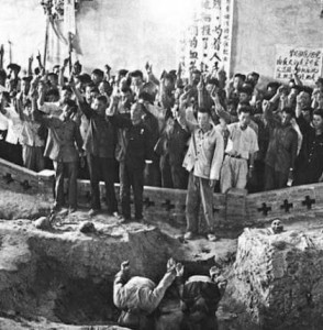 A historical photo showing the public execution of people from the "Black Five Categories" during the Cultural Revolution. Public domain photo via Molihua.