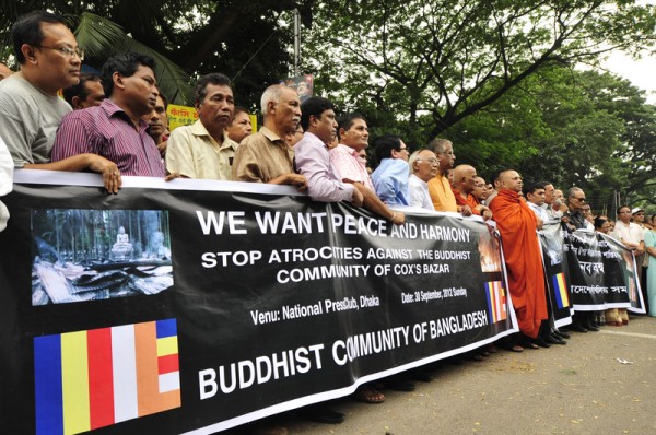 People from the Buddhist community take part at the protest rally in front of the National Press Club in the capital Dhaka. Image by Firoz Ahmed. Copyright Demotix (30/9/2012)