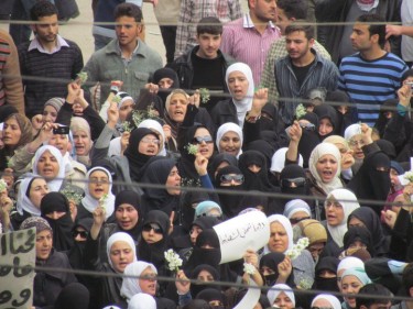  Syrian women protesting in Douma in April, 2011. Photograph from Syriana2011 photostream on flickr, used under  (CC BY 2.0) 