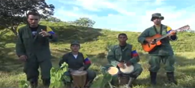 Colombian guerrillas sing rap inspired by forthcoming peace negotiations. Screencapture from video.