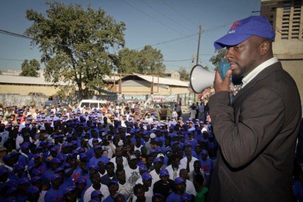 Wyclef Speaking to Crowd In Haiti