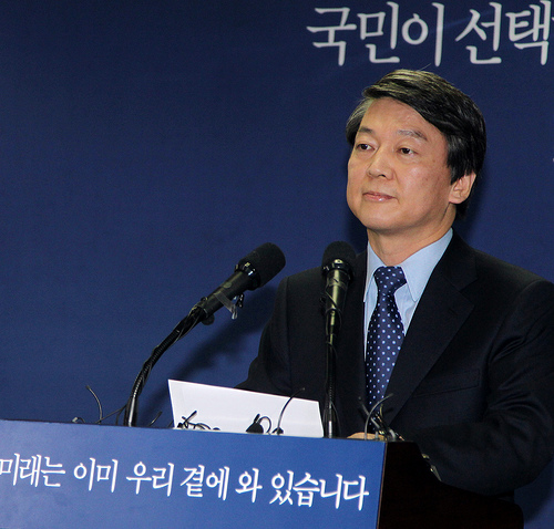 Ahn speaking at a press conference 