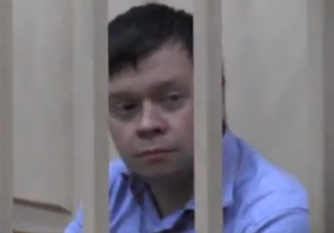 Konstantin Lebedev in pretrial detention, 18 October 2012, screen capture from YouTube.