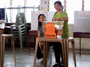 An election polling place in Malaysia in 2008. Photo from Flickr page of owaief89, used under CC License