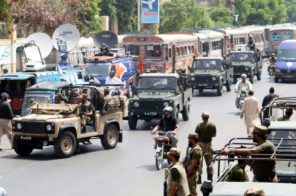 Army officials are patrolling as the army troops have started patrolling in different areas of the city while patrolling has also increased in sensitive areas on the occasion of General Election 2013, in Karachi on Friday May 10, 2013. Image by PPI Images. Copyright Demotix