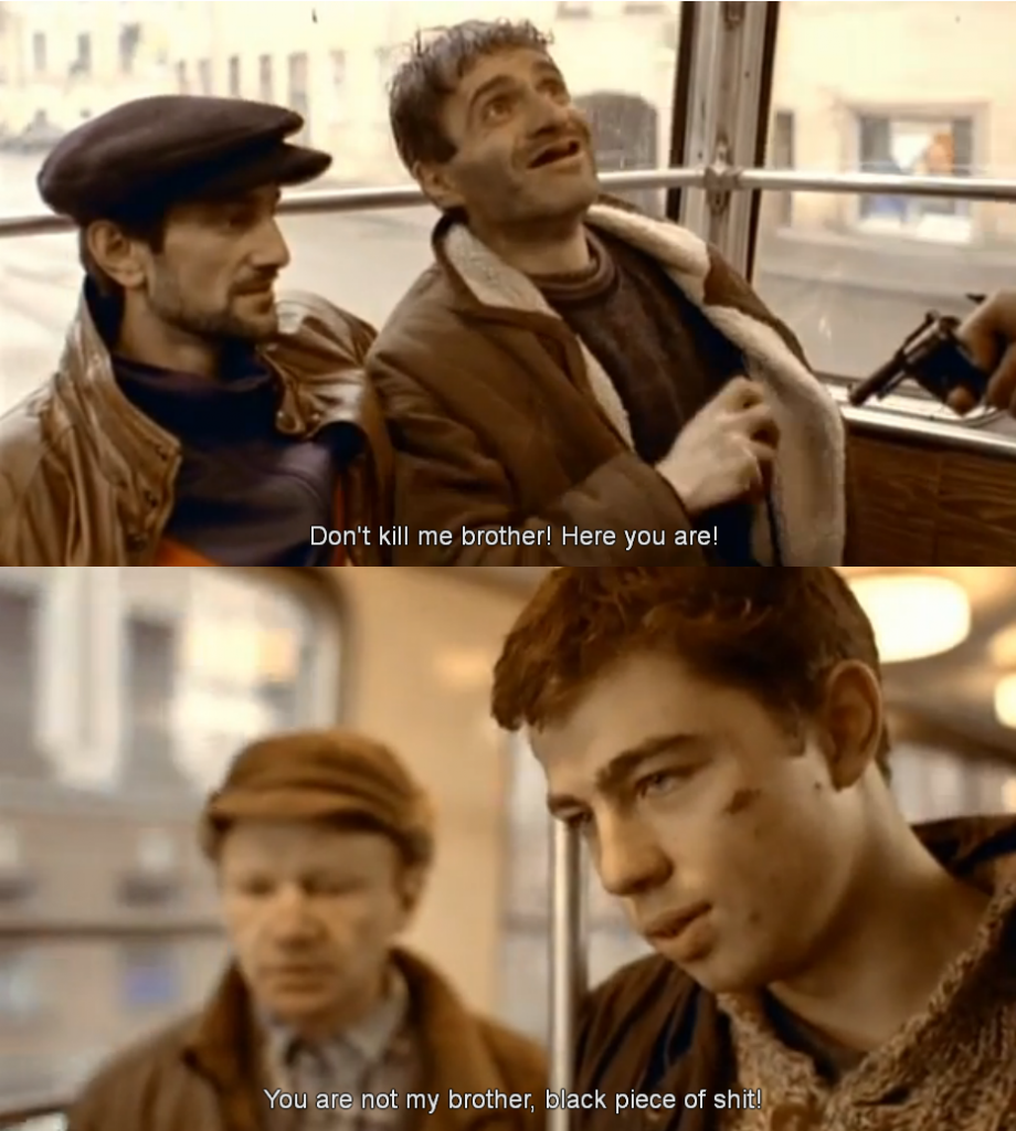 A scene from the cult 90s Russian movie "Brat" (Brother). A veteran of the first Chechen war, played by Danila Bagrov, returns home and finds employment as a mafia hit-man. Here we see him force two raucous North Caucasian immigrants to pay for their tram ticket at the point of a gun. Bagrov's character uses the slur "chernozhopyi" to address them as he his celebrates victory. Some accuse Navalny of exploiting the same populist anti-immigrant sentiments that made this scene popular. YouTube screenshot.