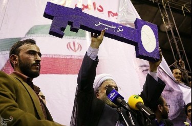 A key, the symbol for Rouhani's campaign