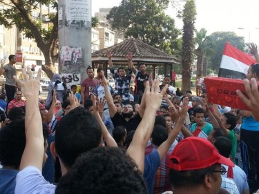Pro-Morsi supporters on the Arab League street in Cairo. Photograph shared by @evanchill on Twitter 