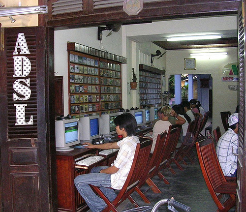 An internet cafe in Vietnam. Image from Flickr page of mikecogh (CC License)
