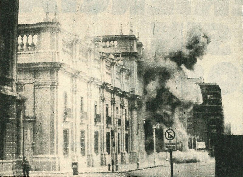 Bombing of La Moneda, September 11, 1973. Image from Wikimedia Commons under Creative Commons license CC BY 3.0 CL